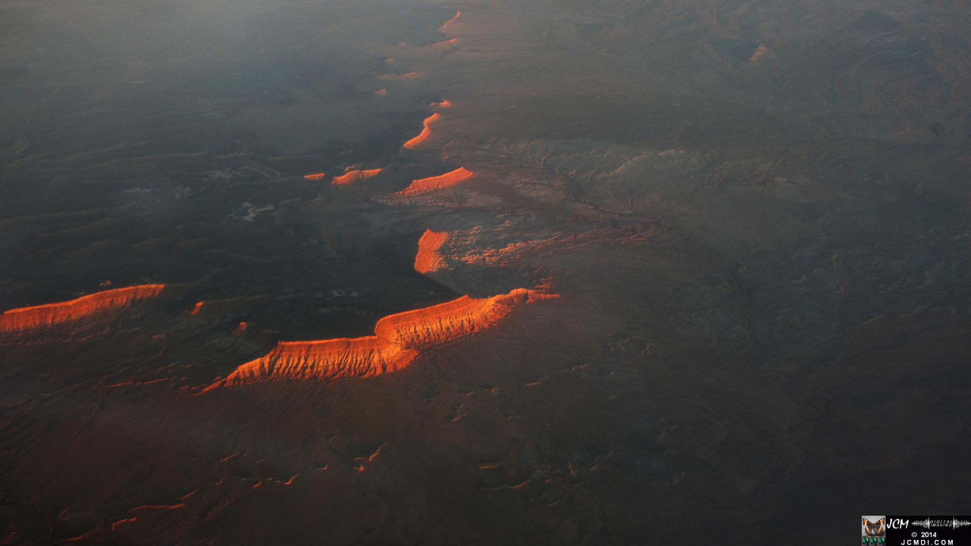 MSP-LAX canyon terrain sunset ridges from airline window